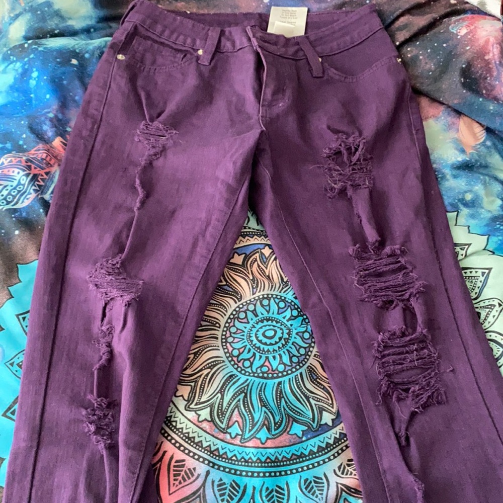 Purple ripped jeans